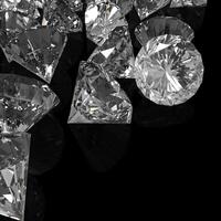 Diamonds isolated on black surface photo