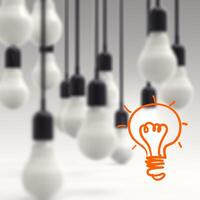 creative idea and leadership concept light bulb on grey photo