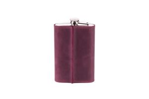 Stainless steel hip flask with leather cover isolated on white background photo