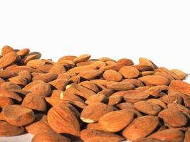 Almonds dried fruit with copy space photo
