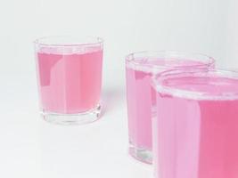 Saft de pomelo rosa foto