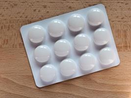 Medical pills on a table photo