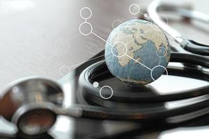 Studio macro of a stethoscope and texture globe with digital tablet with shallow DOF evenly matched abstract as medical network concept Elements of this image furnished by NASA photo