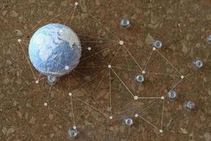 hand drawn texture globe and social network diagram with pin on cork board as concept photo