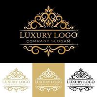 Golden calligraphic floral hand drawn monogram antique vintage style luxury logo design vector