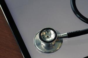 Studio macro of a stethoscope and digital tablet photo