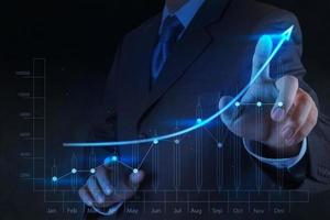 businessman hand touch virtual chart business photo