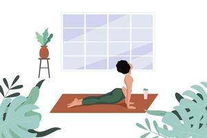 Yoga girl is doing exercises and watching online classes on laptop vector