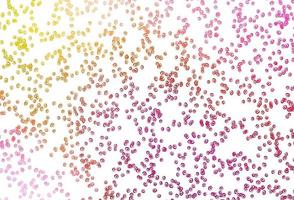 Light Pink, Yellow vector backdrop with dots.