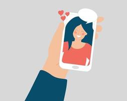 A hand holds a phone and talk in a video call with a happy girl or woman on the screen display. Speech bubble, online smartphone conversation, social media, Couple relationship and friendship concept. vector