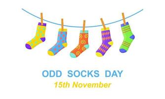 Odd socks day banner. Different colorful odd socks hanging on the rope