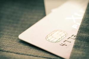 Credit cards in very shallow focus with gray suit background photo