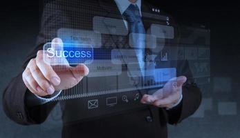 businessman hand pointing to success diagram photo