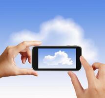 Smart hand using touch screen phone take photo of cloud icon as concept