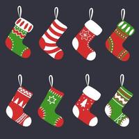 Christmas socks. Vector set isolated on black background.