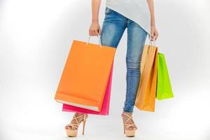 Asian women Beautiful girl is holding shopping bags and smiling photo