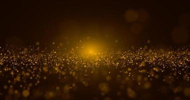 partículas de oro abstractas y fondo de oro bokeh foto