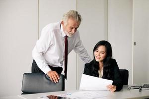 businessmen holding documents for business partners discussing  and share ideas at meeting and business women smiling happy for working photo