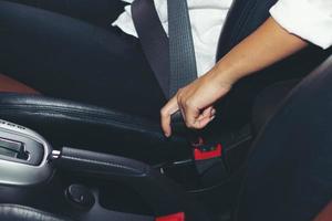 Asian women were locked car seat belt photo