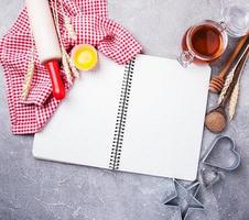 Recipe concept - notebook and ingredients photo