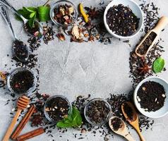 Aromatic dry tea in bowls photo