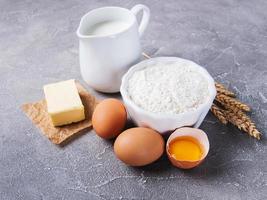 Baking ingredients - flour and eggs photo