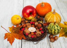 Hazelnuts and pumpkins photo