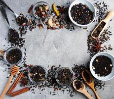 Aromatic dry tea in bowls photo