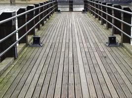 Deck pier on river photo