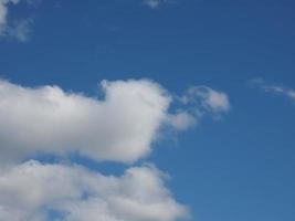 dark blue sky with clouds background photo