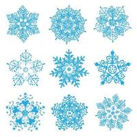 siluetas de copos de nieve dibujadas a mano vectoriales aisladas, iconos vintage de Navidad de invierno vector