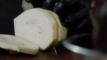 Chef Cuts Eggplant for Cooking. video