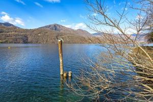 Panorama of the waters of Lake Orta, small lake of glacial origin in the Piedmont Region, Northern Italy.