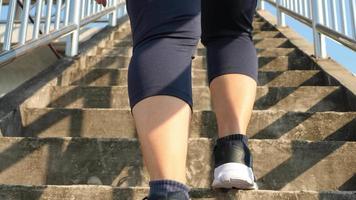 woman walking on footbridge video