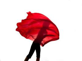 Girl flying red foulard photo