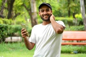 man is using fast 5g net in his mobile photo