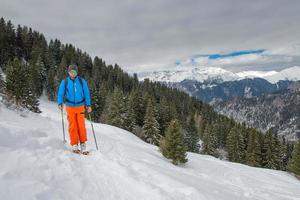 Man with ski mountain photo