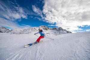 Girl skier in ski area photo