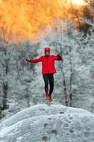 Young sporty man trains in cold winter environment photo