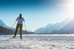 Woman practicing Nordic skiing photo