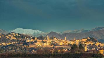 Bergamo Alta with snow in the mountain photo
