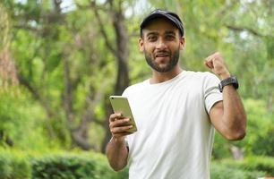 man got good news in his mobile photo