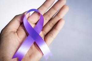 purple ribbon for world cancer day photo background