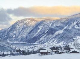 Winter landscape at the fjord lake river in Framfjorden Norway. photo