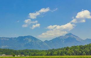 Wonderful mountain and forest landscape with idyllic village in Slovenia. photo