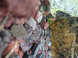 Mix of natural stone and brick background photo