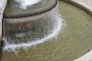 Falling drops down from the fountain in Rome. photo