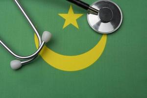 Mauritania flag and stethoscope. The concept of medicine.