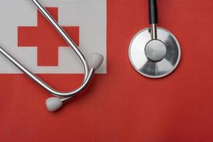 On the flag of Tonga is a stethoscope. photo