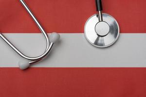 Flag of Austria and stethoscope. The concept of medicine.
